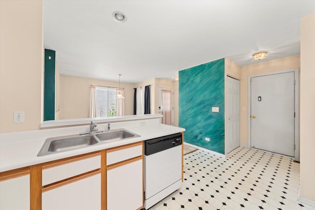 43 Freesia Ct, Romeoville, IL 60446 - kitchen with dishwasher, light floors, light countertops, and a peninsula
