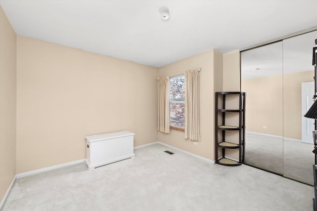 43 Freesia Ct, Romeoville, IL 60446 - unfurnished bedroom with carpet floors and a closet