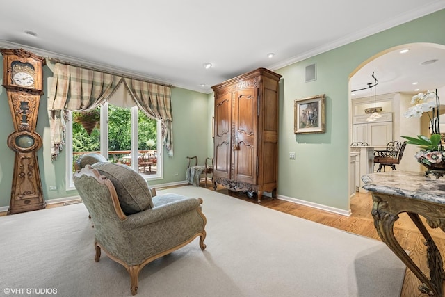 85 Ela Rd, Inverness, IL 60067 - living area with crown molding, light wood-type flooring, arched walkways, and recessed lighting