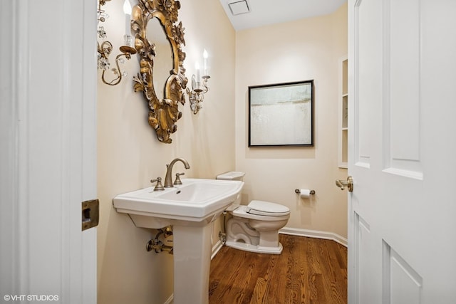 85 Ela Rd, Inverness, IL 60067 - bathroom featuring toilet and wood finished floors