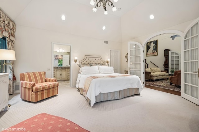 85 Ela Rd, Inverness, IL 60067 - bedroom with vaulted ceiling, light carpet, a chandelier, recessed lighting, and ensuite bathroom