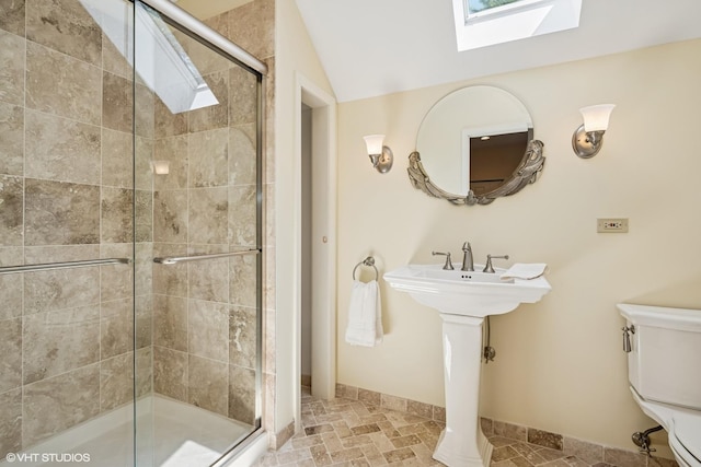 85 Ela Rd, Inverness, IL 60067 - bathroom with a skylight, a shower stall, and lofted ceiling