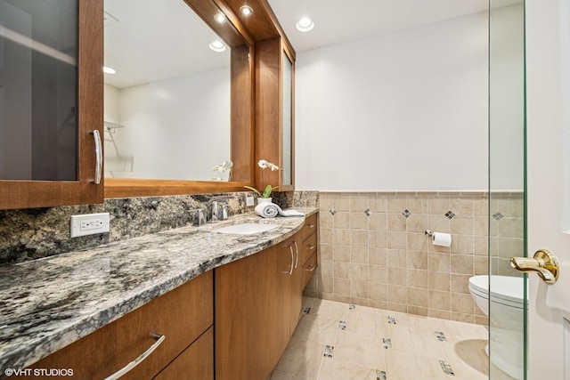 85 Ela Rd, Inverness, IL 60067 - bathroom featuring tile walls, vanity, a wainscoted wall, recessed lighting, and tile patterned flooring
