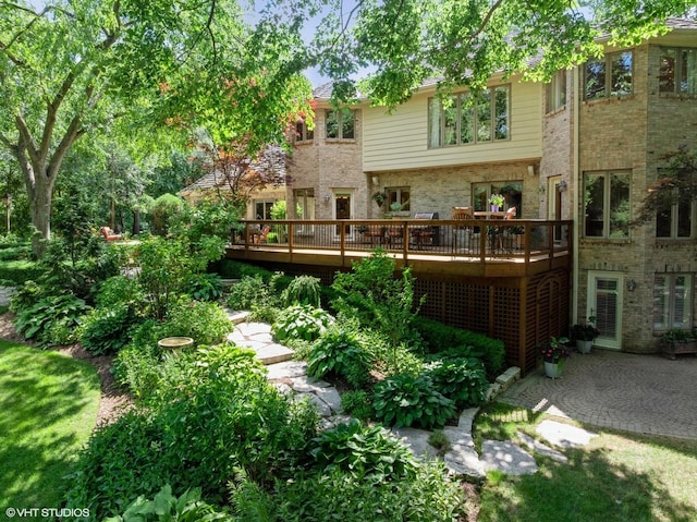 85 Ela Rd, Inverness, IL 60067 - back of house featuring a wooden deck and brick siding