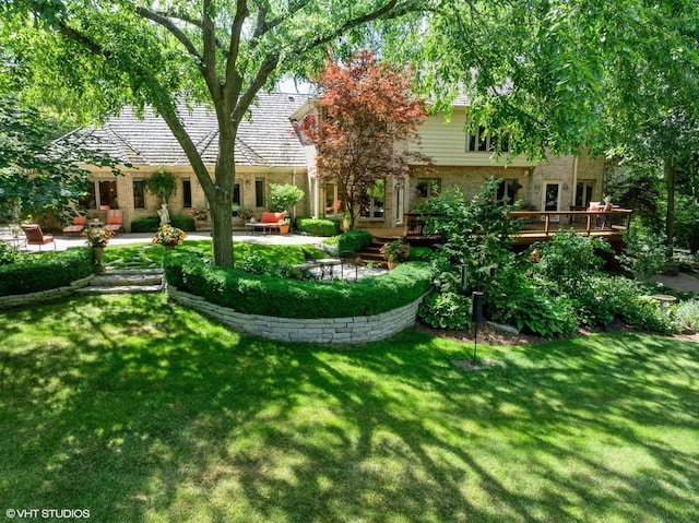 85 Ela Rd, Inverness, IL 60067 - view of green lawn with a deck and a patio