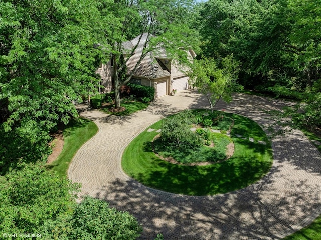 85 Ela Rd, Inverness, IL 60067 - view of front of home with driveway and an attached garage