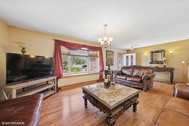 8437 167th St, Tinley Park, IL 60487 - living area featuring a chandelier and light wood finished floors