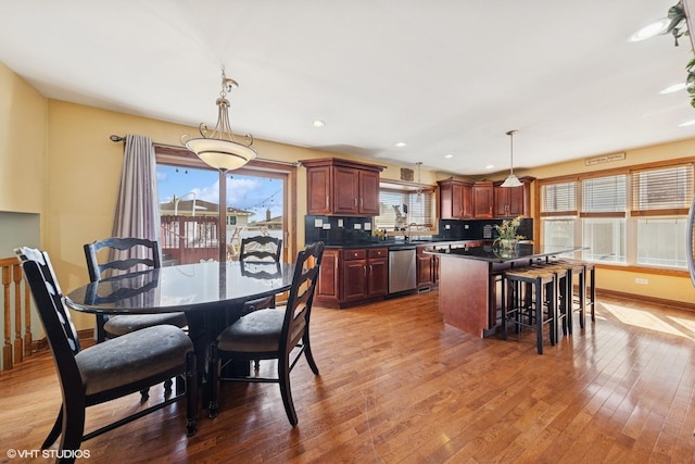 8437 167th St, Tinley Park, IL 60487 - dining room with light wood-style floors and recessed lighting