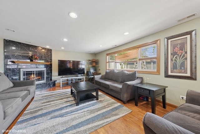 8437 167th St, Tinley Park, IL 60487 - living area featuring wood finished floors, recessed lighting, and a high end fireplace