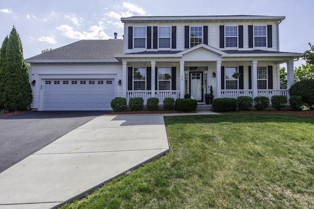 1650 Natures Way, Lindenhurst, IL 60046 - view of front of home featuring driveway, covered porch, a garage, and a front yard