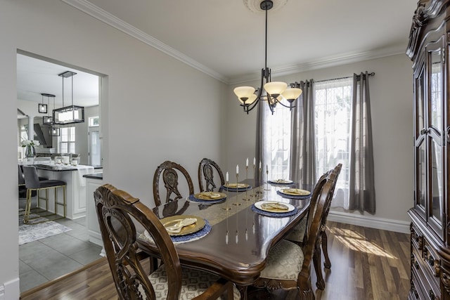 1650 Natures Way, Lindenhurst, IL 60046 - dining space featuring a chandelier, ornamental molding, and dark wood-style floors
