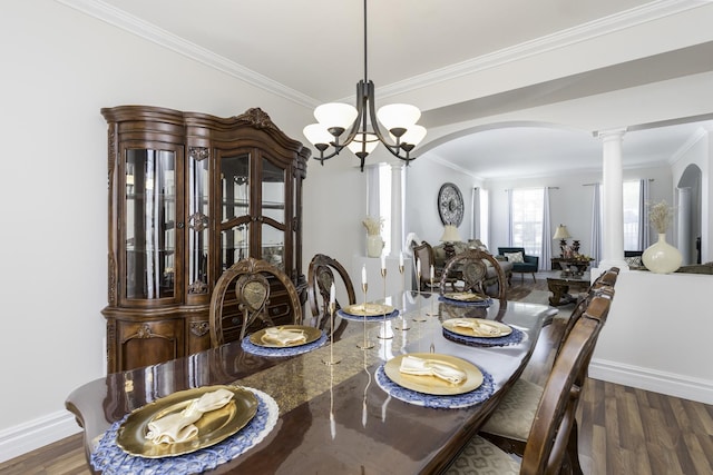 1650 Natures Way, Lindenhurst, IL 60046 - dining space with arched walkways, a chandelier, ornamental molding, ornate columns, and wood finished floors