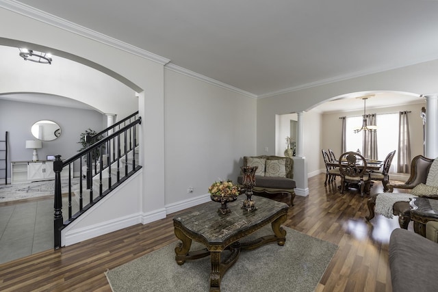 1650 Natures Way, Lindenhurst, IL 60046 - living room with arched walkways, decorative columns, wood finished floors, ornamental molding, and stairway