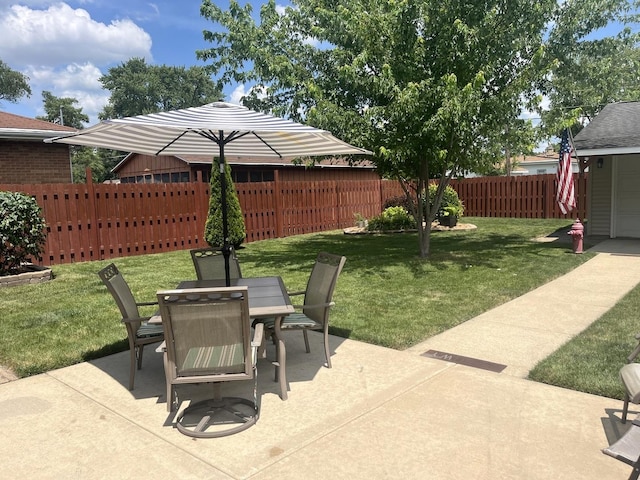1620 S 5th Ave, Kankakee, IL 60901 - fenced backyard with outdoor dining space and a patio area