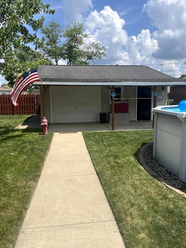 1620 S 5th Ave, Kankakee, IL 60901 - view of front of house with an attached garage, driveway, and a shingled roof
