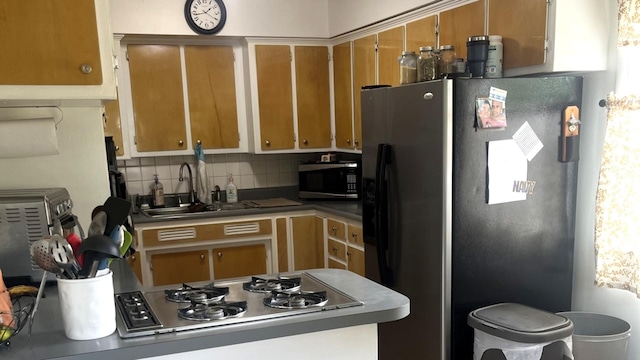 1620 S 5th Ave, Kankakee, IL 60901 - kitchen with stainless steel appliances and tasteful backsplash
