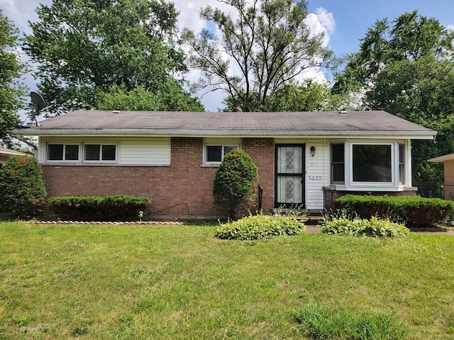 3025 Sherwood Ave, Markham, IL 60428 - ranch-style house with a front yard and brick siding