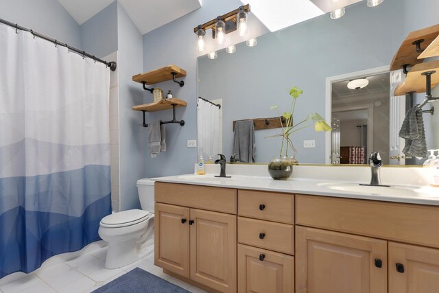 262 Hawk Hollow Dr, Bartlett, IL 60103 - bathroom featuring double vanity, tile patterned floors, and a shower with curtain