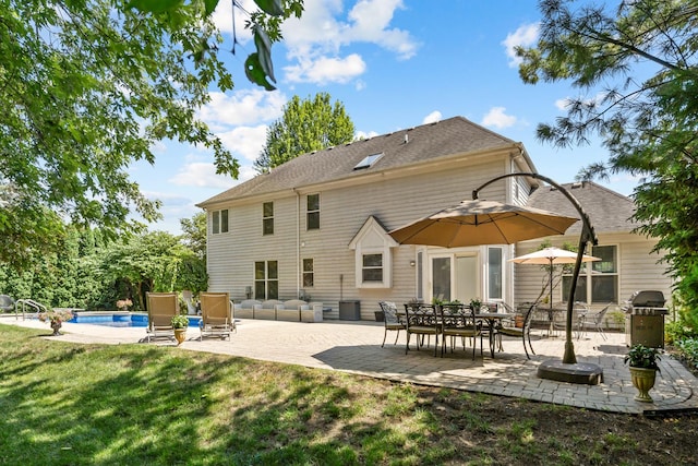 262 Hawk Hollow Dr, Bartlett, IL 60103 - rear view of property with a patio, a yard, an outdoor pool, and roof with shingles