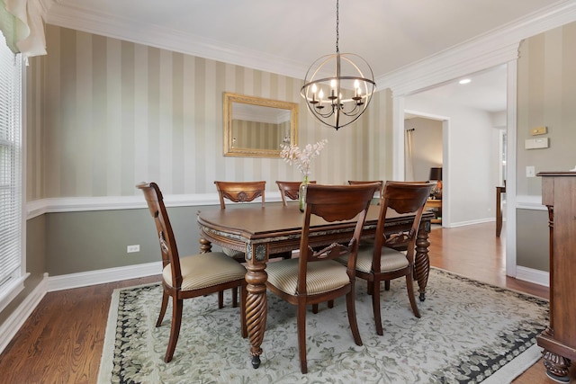 262 Hawk Hollow Dr, Bartlett, IL 60103 - dining room with a chandelier, wood finished floors, and crown molding