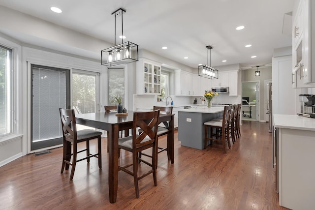 262 Hawk Hollow Dr, Bartlett, IL 60103 - dining space with healthy amount of natural light, dark wood-style flooring, and recessed lighting
