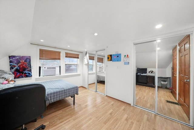 8020 S Mozart St, Chicago, IL 60652 - bedroom featuring multiple closets, vaulted ceiling, light wood-type flooring, cooling unit, and recessed lighting
