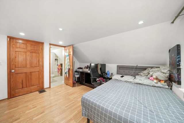 8020 S Mozart St, Chicago, IL 60652 - bedroom featuring light wood-style flooring, recessed lighting, lofted ceiling, and connected bathroom