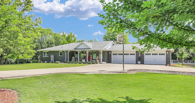 401A County Road 2500 N, Mahomet, IL 61853 - ranch-style house featuring concrete driveway, a front lawn, covered porch, and a garage
