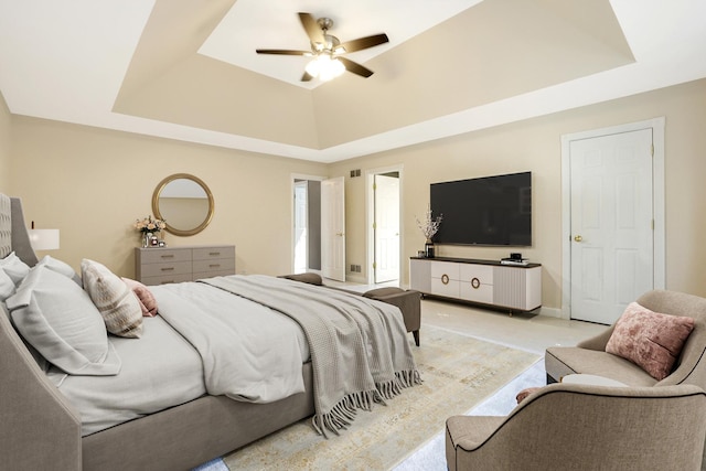 441 Wheeler Dr, Lemont, IL 60439 - bedroom featuring a raised ceiling, light carpet, and ceiling fan