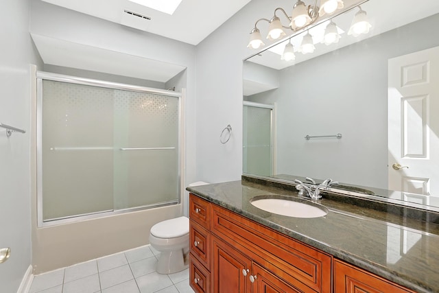 441 Wheeler Dr, Lemont, IL 60439 - bathroom with tile patterned flooring, vanity, and combined bath / shower with glass door