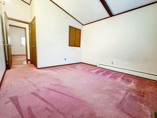 202 E 8th St, Gridley, IL 61744 - spare room featuring lofted ceiling, baseboard heating, light carpet, and ornamental molding