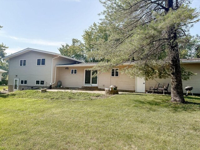 202 E 8th St, Gridley, IL 61744 - back of property featuring a lawn