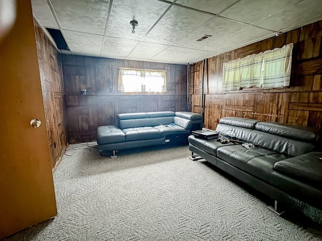 202 E 8th St, Gridley, IL 61744 - carpeted living room with wood walls