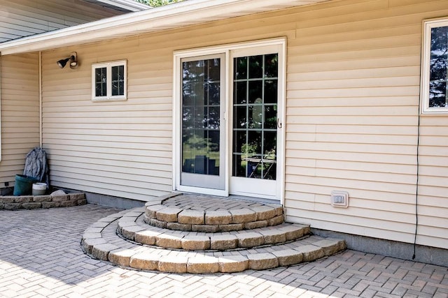 202 E 8th St, Gridley, IL 61744 - doorway to property featuring a patio area