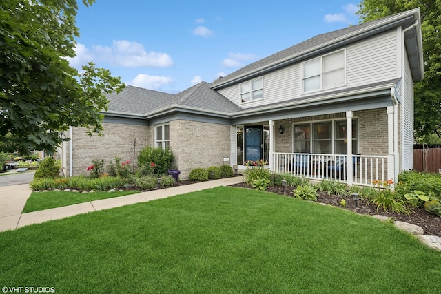 1177 Dovercliff Way, Crystal Lake, IL 60014 - traditional home featuring covered porch, brick siding, a front yard, and a shingled roof