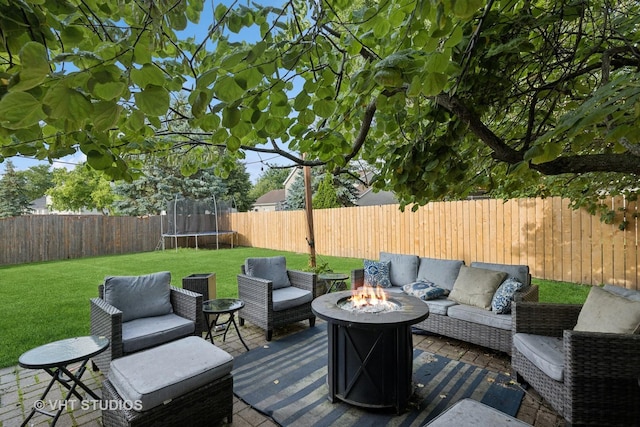1177 Dovercliff Way, Crystal Lake, IL 60014 - wooden terrace featuring a trampoline, an outdoor living space with a fire pit, and a fenced backyard