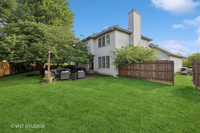 1177 Dovercliff Way, Crystal Lake, IL 60014 - back of property with a chimney, an outdoor hangout area, and a patio area