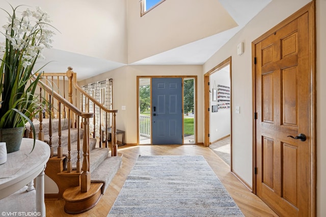 1177 Dovercliff Way, Crystal Lake, IL 60014 - entryway featuring plenty of natural light, stairs, and light wood-style flooring