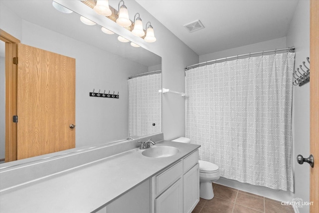 307 Gregory Ln, Plano, IL 60545 - full bathroom with vanity, tile patterned flooring, and a shower with curtain
