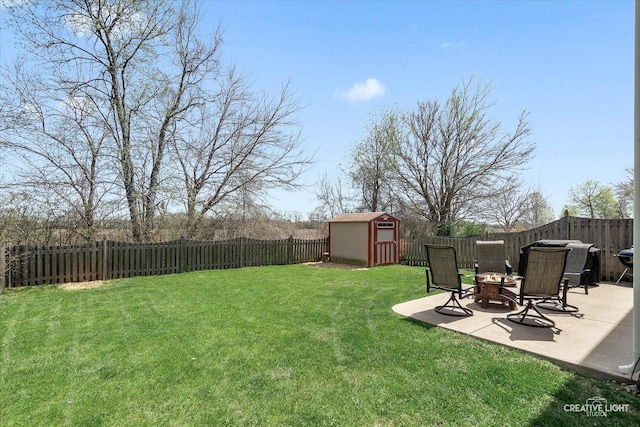 307 Gregory Ln, Plano, IL 60545 - fenced backyard featuring a shed, a patio area, and an outdoor fire pit
