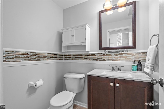 307 Gregory Ln, Plano, IL 60545 - bathroom featuring vanity and a wainscoted wall