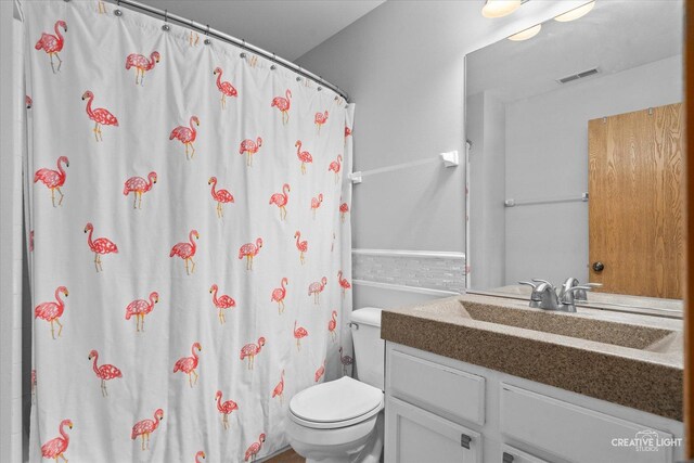 307 Gregory Ln, Plano, IL 60545 - bathroom with vanity and curtained shower