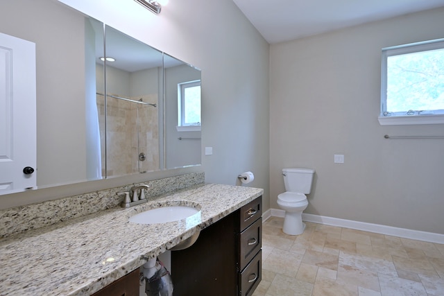 315 N Ridgeland Ave, Elmhurst, IL 60126 - bathroom featuring vanity, a shower, and stone finish floors