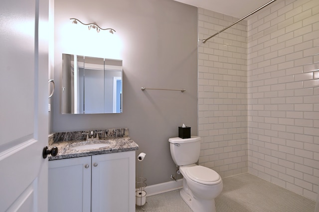 315 N Ridgeland Ave, Elmhurst, IL 60126 - bathroom featuring vanity, tiled shower, and tile patterned floors