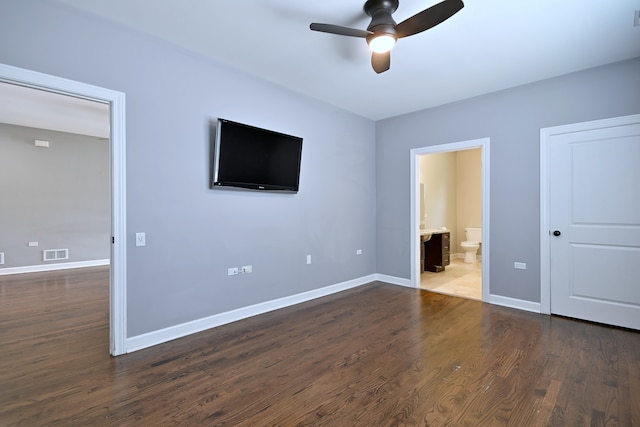 315 N Ridgeland Ave, Elmhurst, IL 60126 - unfurnished bedroom featuring dark wood finished floors, ensuite bathroom, and a ceiling fan