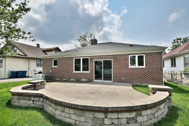 315 N Ridgeland Ave, Elmhurst, IL 60126 - back of house featuring a patio, brick siding, and a chimney