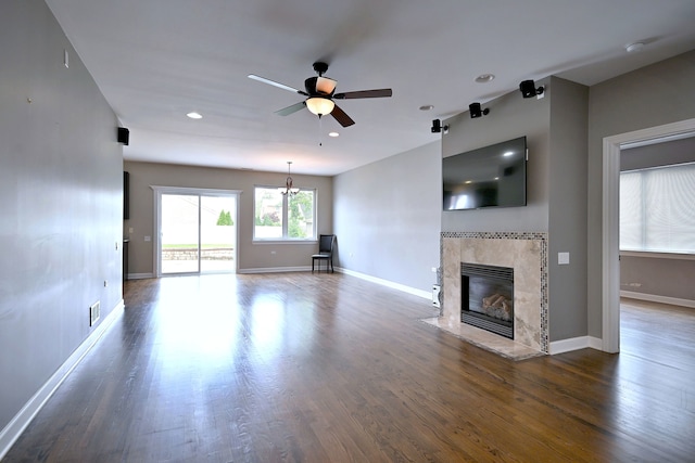 315 N Ridgeland Ave, Elmhurst, IL 60126 - unfurnished living room with ceiling fan, a fireplace, wood finished floors, recessed lighting, and a chandelier