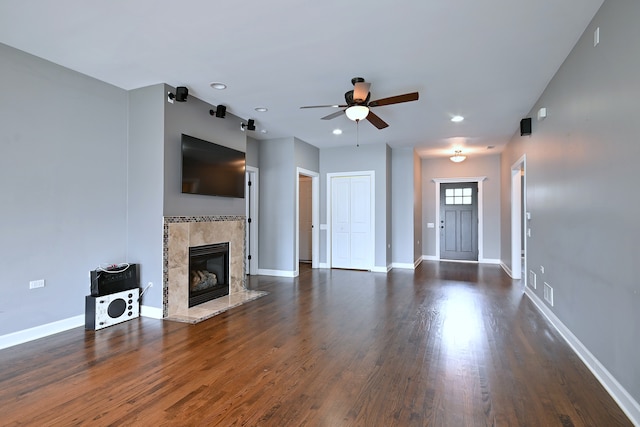 315 N Ridgeland Ave, Elmhurst, IL 60126 - unfurnished living room featuring a ceiling fan, a tile fireplace, dark wood-type flooring, and recessed lighting
