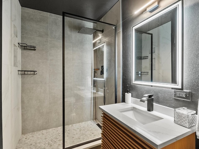 940 E Old Willow Rd Unit 305, Prospect Heights, IL 60070 - bathroom featuring a tile shower and vanity