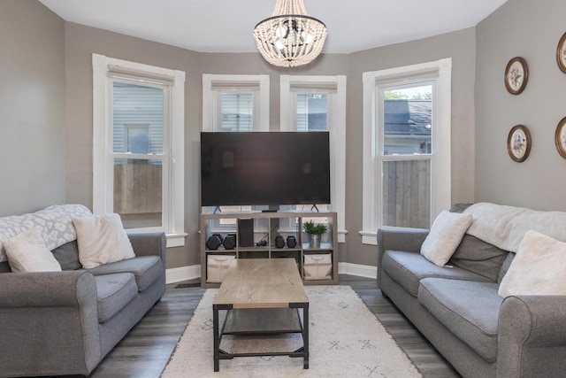 1404 Fell Ave, Bloomington, IL 61701 - living room with a chandelier and wood finished floors